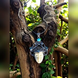 NWT Carved Goddess Face Blue Topaz Pendant